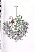 A hand-drawn or printed illustration of a floral pendant necklace design on a white background, featuring a large white flower with a brown center, green leaves, and an intricate black line pattern below.